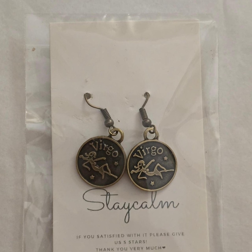 Virgo earrings with zodiac‎ symbol and stars in a brass color